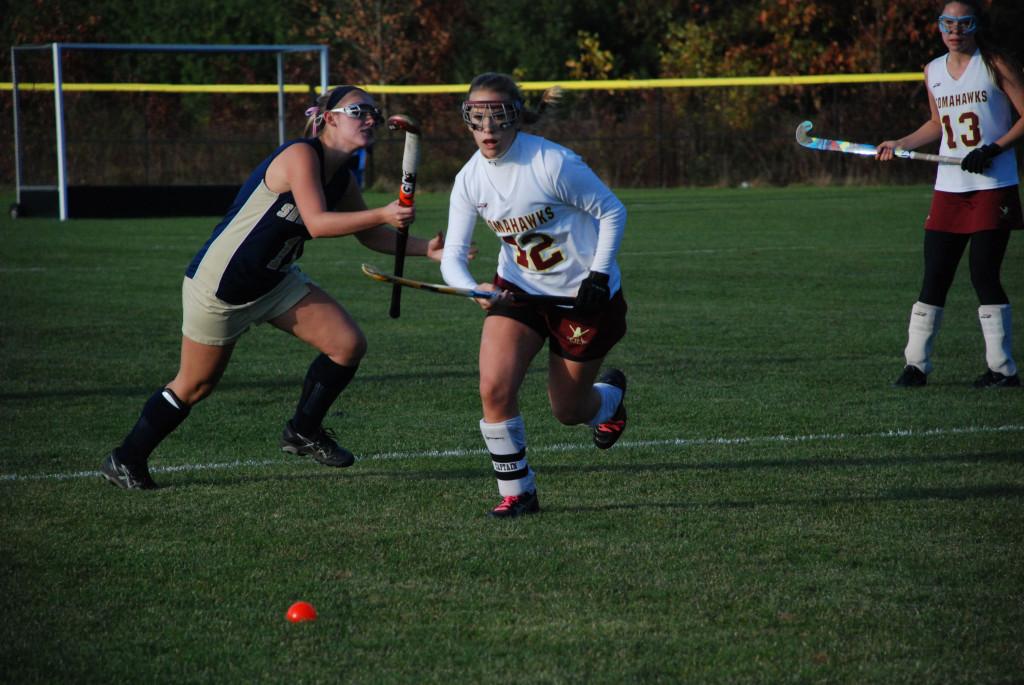 Molly Dore chases the free ball late in the game on Oct. 25 against Shrewsbury.