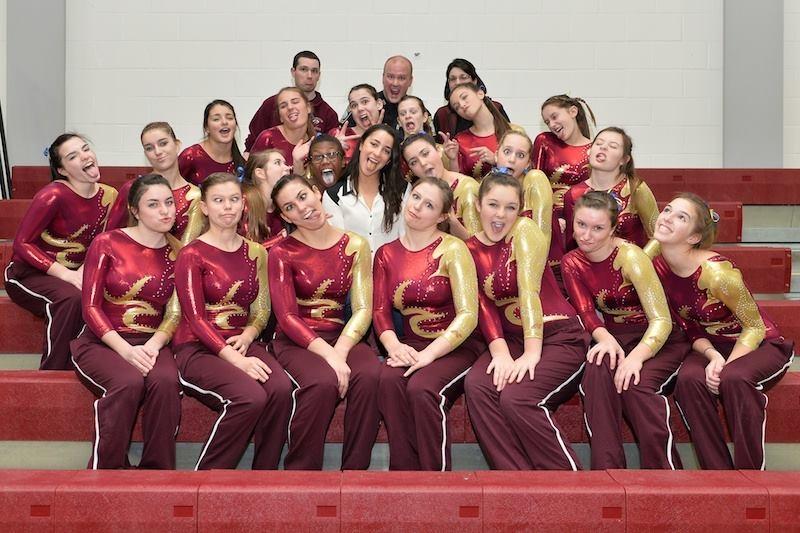 The ARHS gymnastics team poses and goofs around with USA olympian Aly Raisman at the Boston Strong Classic Gymnastics Event at ARHS on January 4.