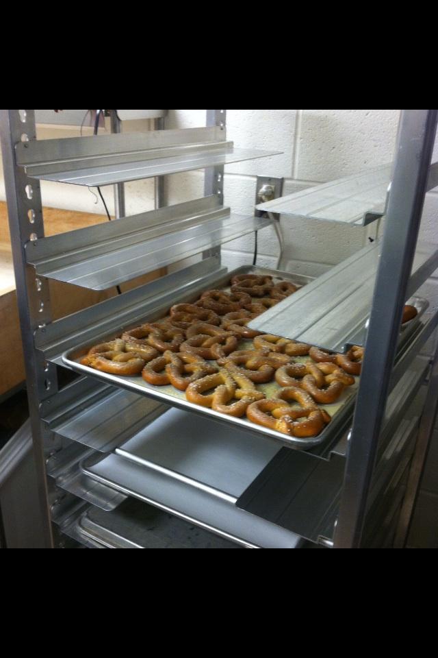 Soft pretzels, which were recently added to the menu, await the lunch crowd on a tray in the kitchen.