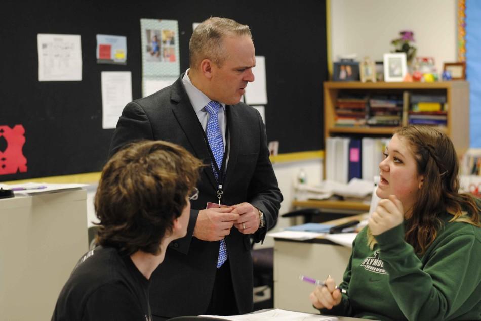 MA Secretary of Education Matthew Malone visits a calculus class and talked with seniors Morgan Carter and Jem Sibbick about their future plans.