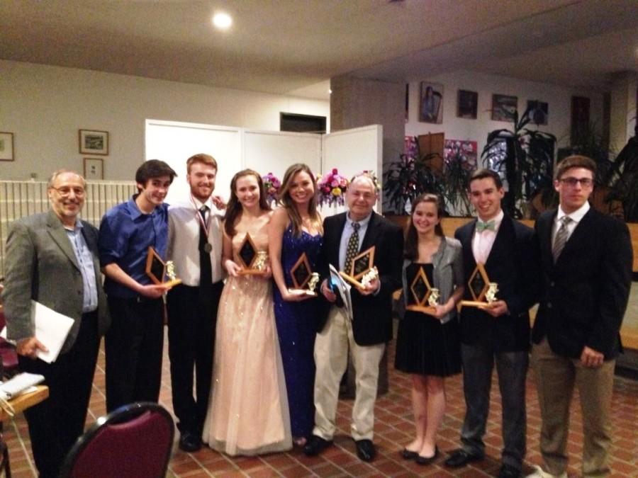 Representatives from the cast of Damn Yankees show off their 6 TAMY awards.