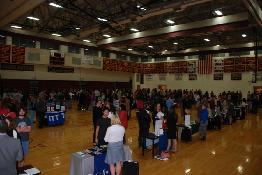The college fair in full swing as students rotate from booth to booth hoping to find their dream school.