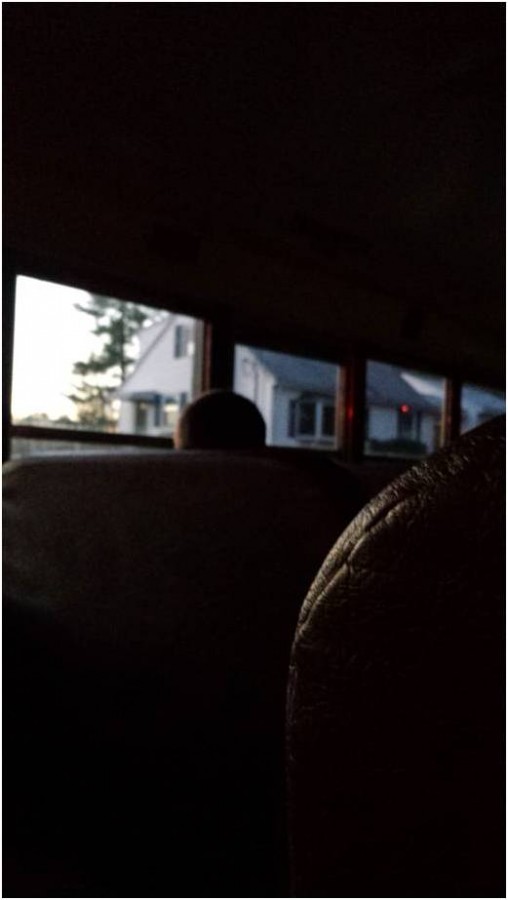 Sophomore Evan Bramhill looks out the bus window on his way to school.