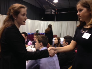 Senior Brianna Burns and junior Annie Campbell practice their handshake skills before their separate role plays.