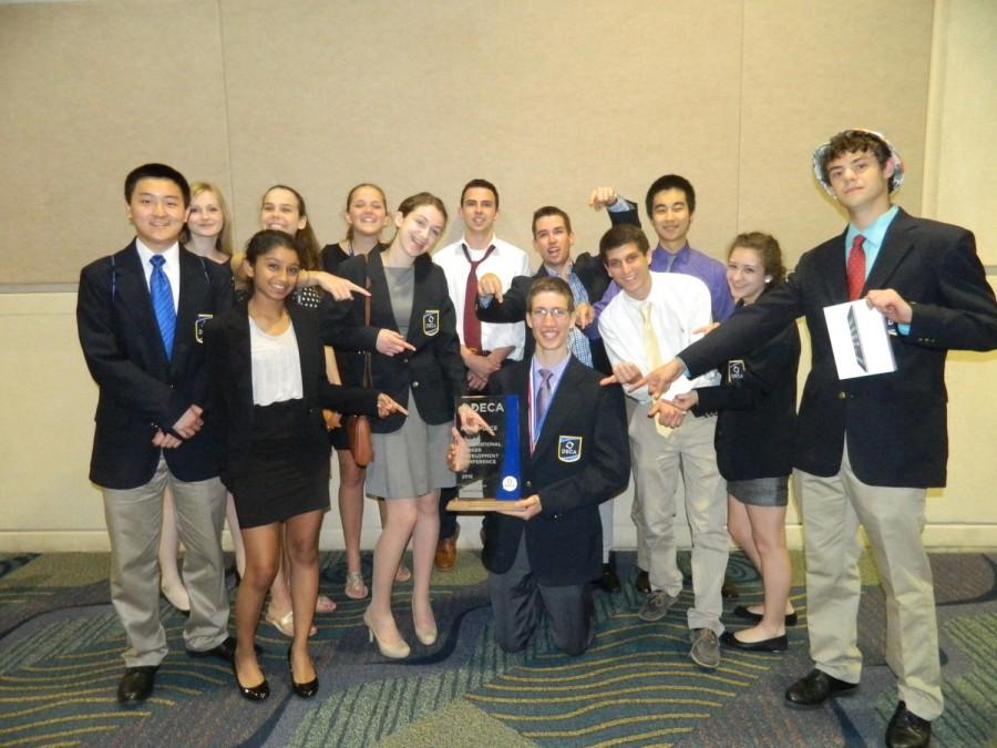 ICDC participants surround senior Eric Kerstens after his first place win at Internationals.