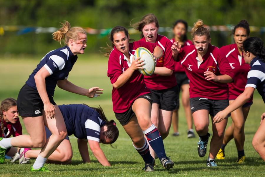 Carrying+the+ball+up+the+field%2C+senior+Maggie+Scott+helps+the+girls+rugby+team+cruise+to+victory.