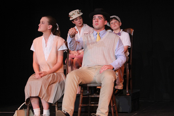 Junior John Clark drives freshman Bridget Brady, junior Sarah Milnamow, and Jake Gibbons to Camden,NJ during their performance of Journey to Camden on May 29.