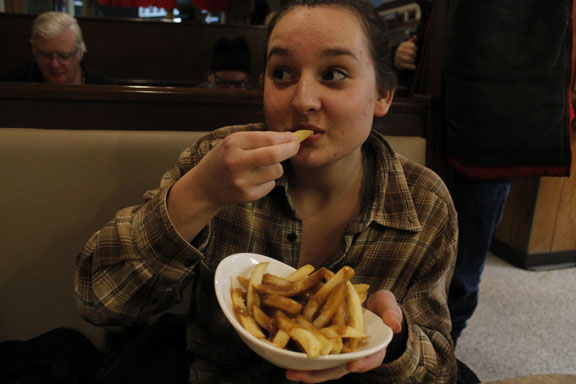 Morkert enjoys some fries from Harrys.