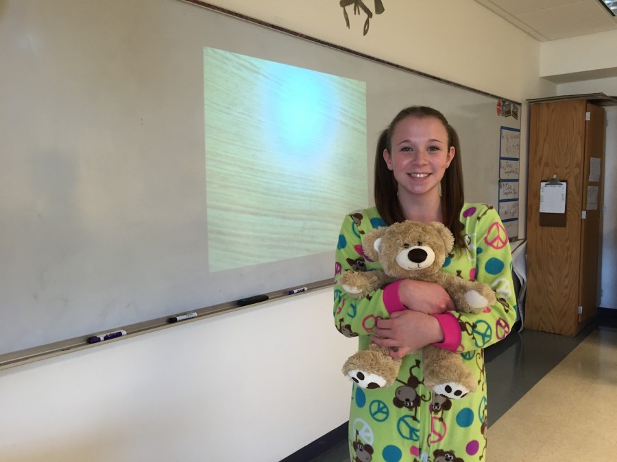 Junior Kathryn Kearney sporting a stylish onesie completed with a ponytail and teddybear.