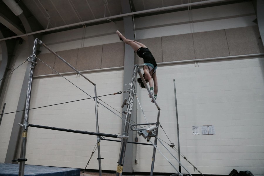 Last season then freshman Julia Callaghan performed a routine on the parallel bars.