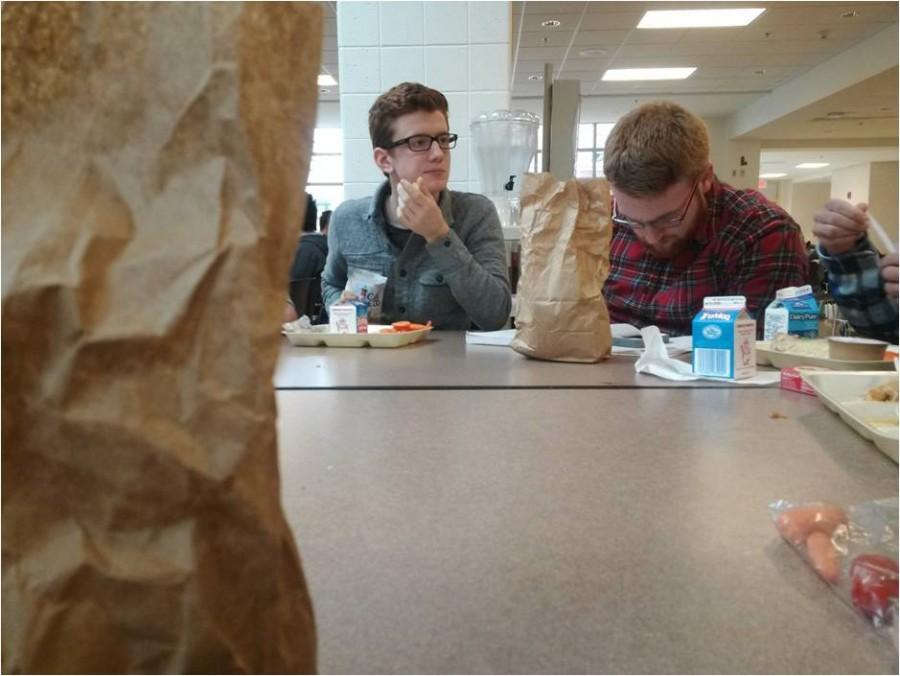 Seniors Max Slingluff and Henry Fournier enjoy some down time at lunch.