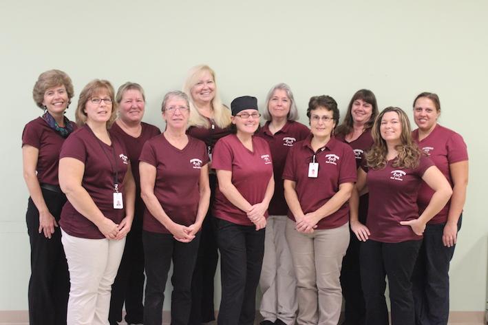 There are thirteen cafeteria workers including (left to right) Jill Araujo, Leslie Foley, Norene Cooley, Betsy Swallow, Theresa Johnson, Noreen McKnight, Deborah Pojani, Dianne Cofer, Kellie Blakesly, Pamela Hodge, and Marybeth Costello (not pictured: Maria Cavicchi and Karin West). 