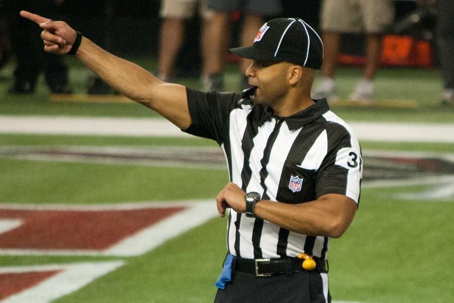 An NFL referee on the field for the Atlanta Falcons against the Carolina Panthers on September 30, 2012 at the Georgia Dome.