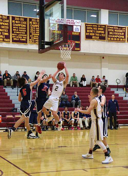 Senior Gavin Boyden (#2) goes for a layup against North Middlesex on January 12. 