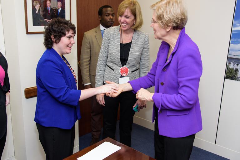 Senior Rachel Seymour shakes hands with Senator Elizabeth Warren at Capitol Hill, accompanied by Patti Doherty, Special Olympics Youth Engagement and Schools Manager. 