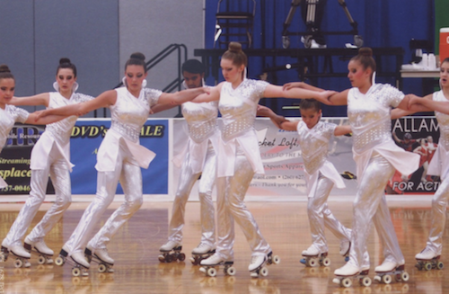 Senior Lauren McKie found her sport in competitive roller skating. Above, McKie (center) performs a routine with teammates at a competition. 