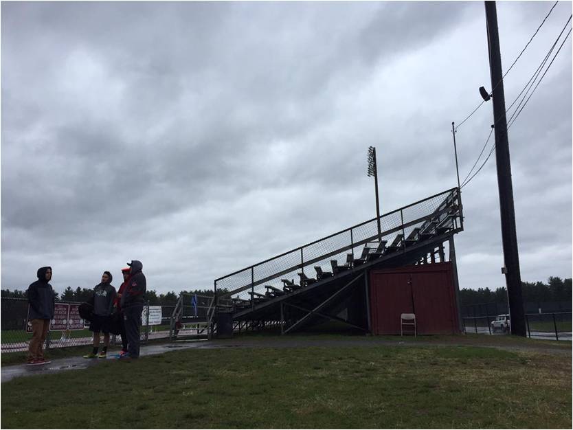 After the boys’ track meet was cancelled, they waited in the rain to see if the girls’ meet was still on and if they can help. “I’m helping you guys make sure the meet happens,” senior Nick Hong said as he attempted to wipe the puddles off the track.