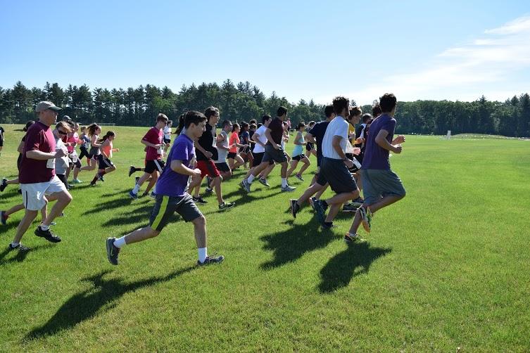 Current+and+former+cross+country+runners%2C+parents%2C+and+teachers+begin+the+three+mile+race+to+raise+funds+for+the+teams.