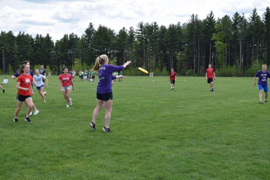 Freshman Tyler Potter reaches out for a Frisbee against a game with the juniors.