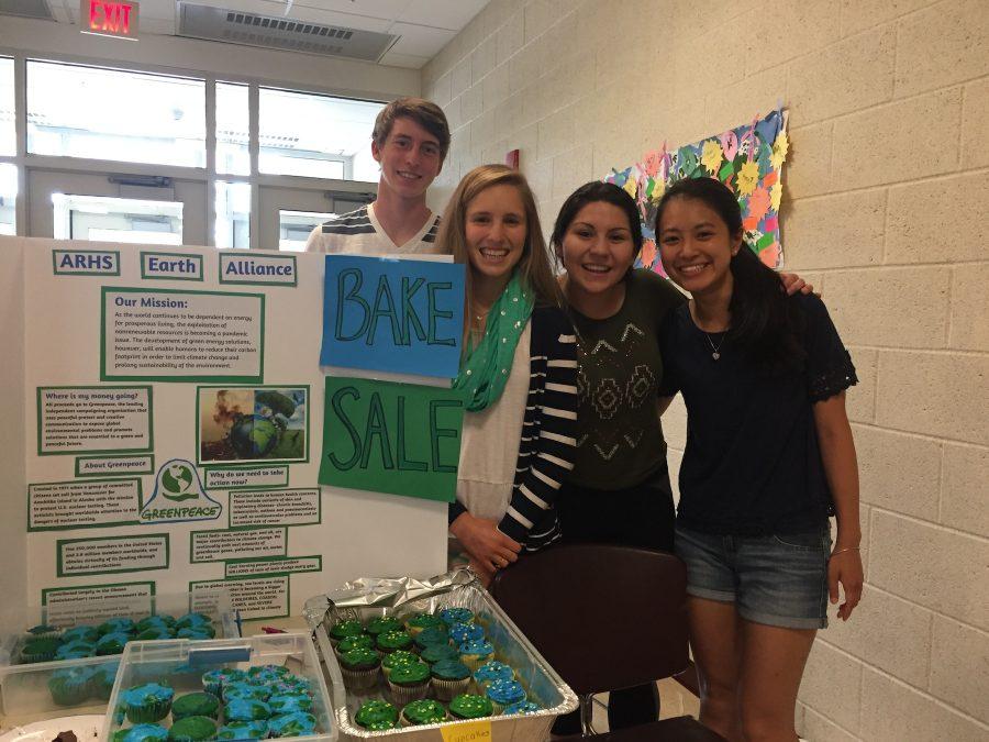 Juniors Everett Pirtle, Gretchen Forbush, Gabi Thompson, and Katelyn Li raise money and awareness for climate change  through a  bake sale.