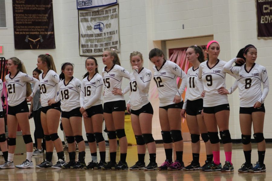 Players line up following introductions, anticipating the game with a mix of nerves and excitement.