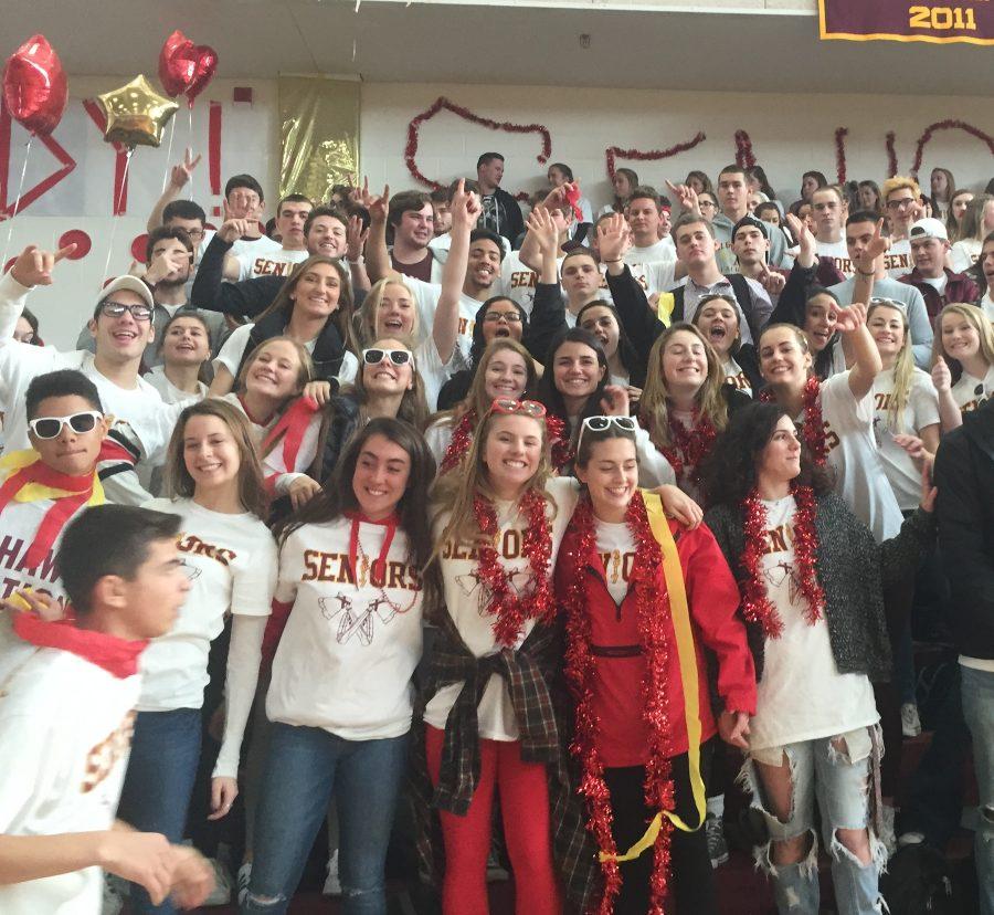 Seniors get rowdy at the pep rally before the annual Thanksgiving football game against Westborough. Students and faculty gathered in the gym to celebrate the early release before the holiday break on Wednesday, November 23. 