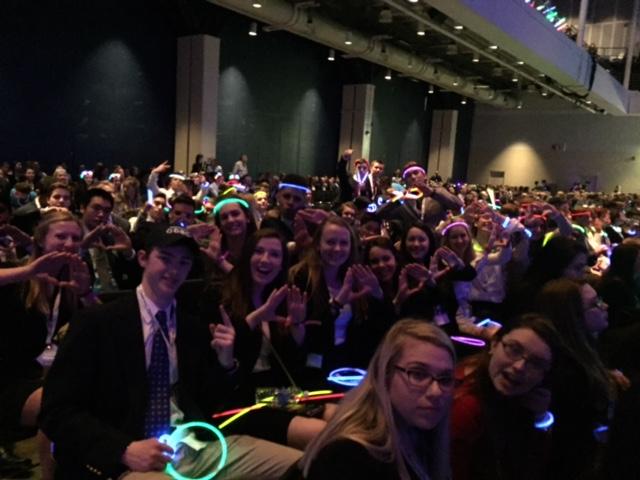 DECA members await the awards ceremony at States with celebratory glow sticks. 
