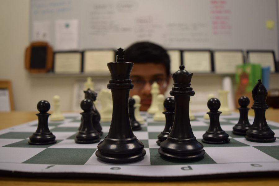 Freshman chess prodigy Bharath Heggadahalli concentrates on his next move.