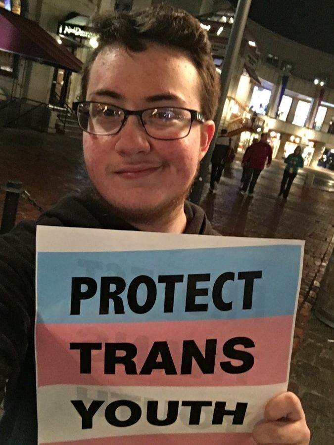 Sophomore Eli Cohen-Gordon attended a rally in Boston against President Trumps reversal of former President Obama’s protections of transgender students. 