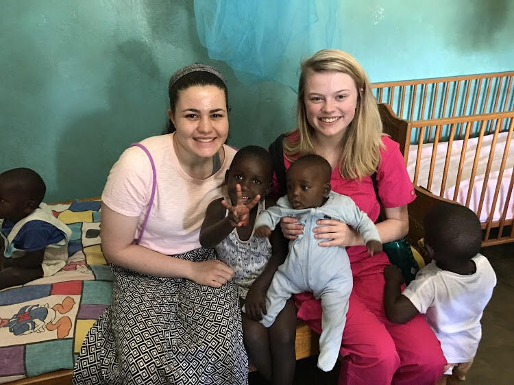 Senior Kelsey Blair (right) traveled to Kasungu, Malawi with Bridges to Malawi to help local villages with healthcare. 