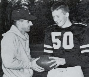 Dick Walsh at the first ARHS Thanksgiving Day football game with captain Paul Pisinski in 1959. 