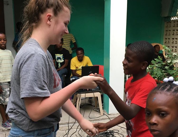 Sophomore+Lauren+Earley+%28left%29+traveled+to+Haiti+for+the+second+time+to+volunteer+at+an+orphanage.