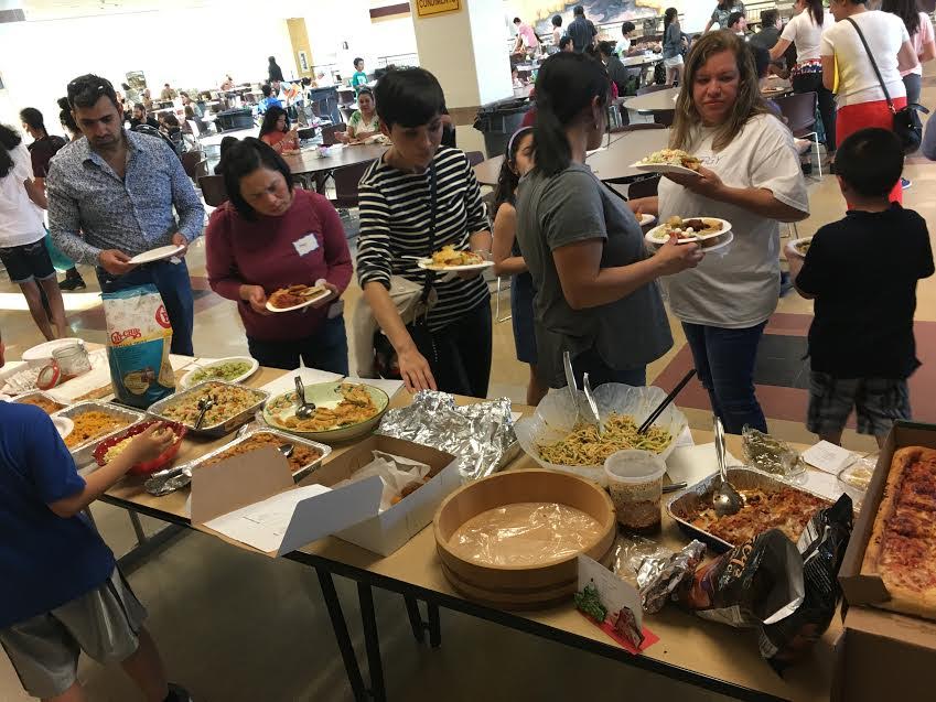 Families at International Night brought foods from their cultures for other families to try.