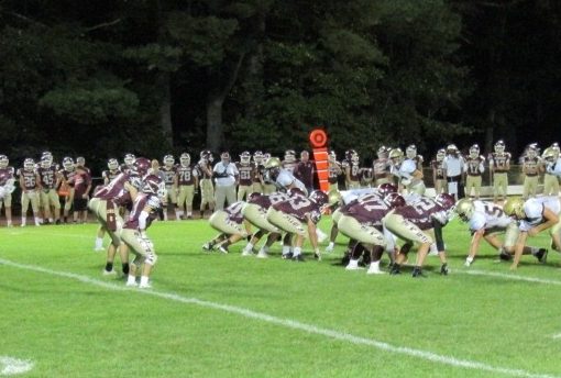 Football players prepare for their next play at home vs. Shepherd Hill on September 28.