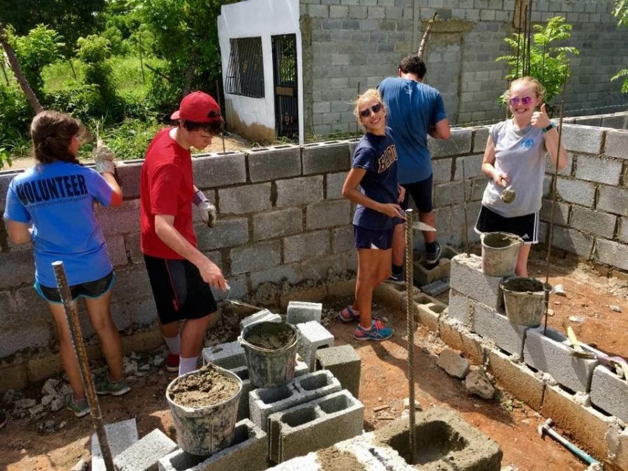 Sophomore Abby Barnes (right) traveled to the Dominican Republic, rebuilding a house and teaching children in impoverished areas.