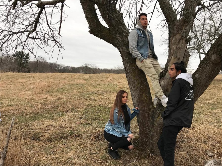 Breakneck Hill produces hip hop and rap music and visual art. Chloe Hong [left], alumni Nick Hong [middle], Ali Saeed [right] promote their brand and add to their artistic aesthetic. 