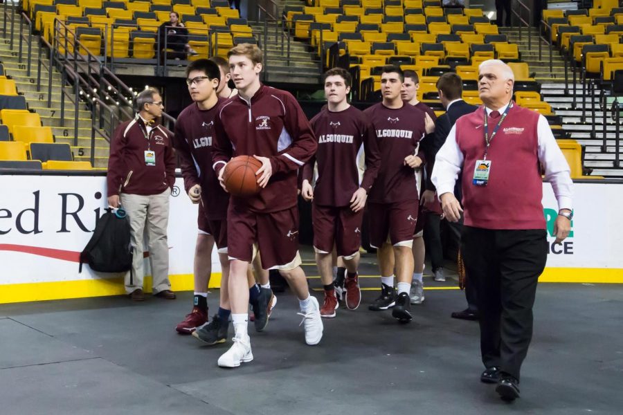 Boys+basketball+walks+onto+the+court+at+TD+Garden+to+play+against+Westford+Academy.+