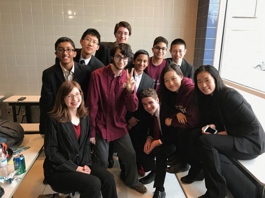 The+Speech+and+Debate+Clubs+junior+vice+president+Nellie+Zhang+%5Bfar+right%5D+shares+what+goes+on+in+club+meetings.+