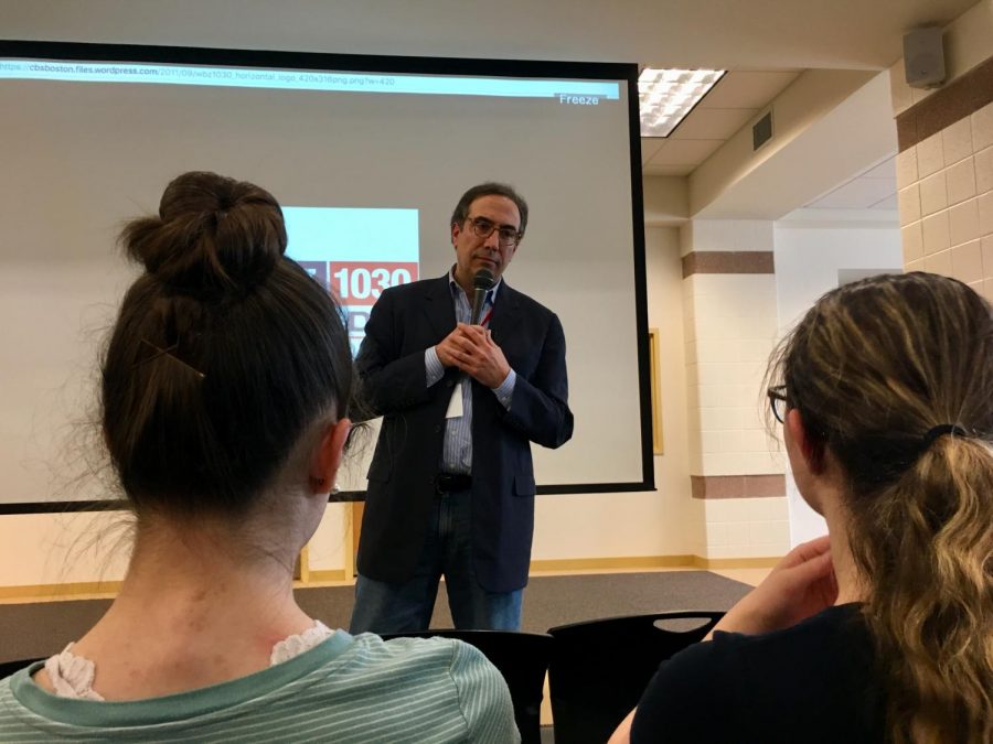 WBZ morning radio anchor Josh Binswanger engages with the audience during a Q&A session following his broacast career presentation with co-worker Matt Ledin.