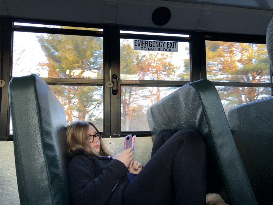 During a 6 am bus ride to school, sophomore Keelin McWalter takes a break from scrolling through her instagram feed to rest her eyes. 