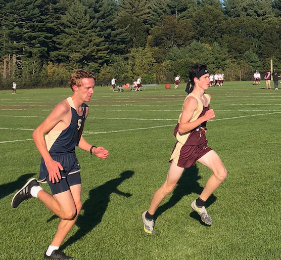 Sophomore Will Lamburn speeds past his opponent, placing first in the meet. 