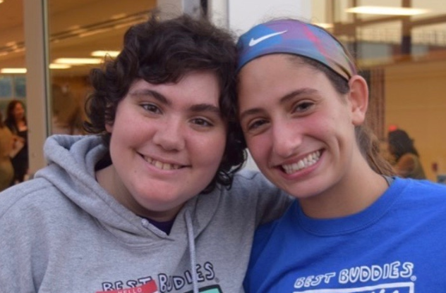 Junior Jordan Manousos (right) smiles with her buddy Rachel Seymour (left).