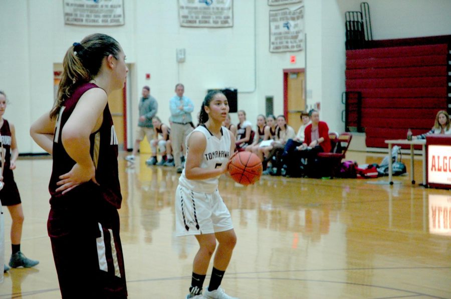 Senior Naraylee Baez prepares to take a free throw. Baez led the T-Hawks in scoring with 10 points.