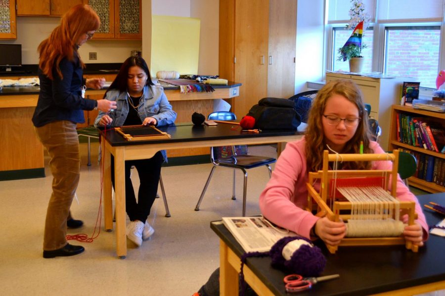 Junior Kayly Somers learns to weave in a STEP block offered during a pilot week.  No STEP blocks will be added next year due to planning and budgetary restraints. 