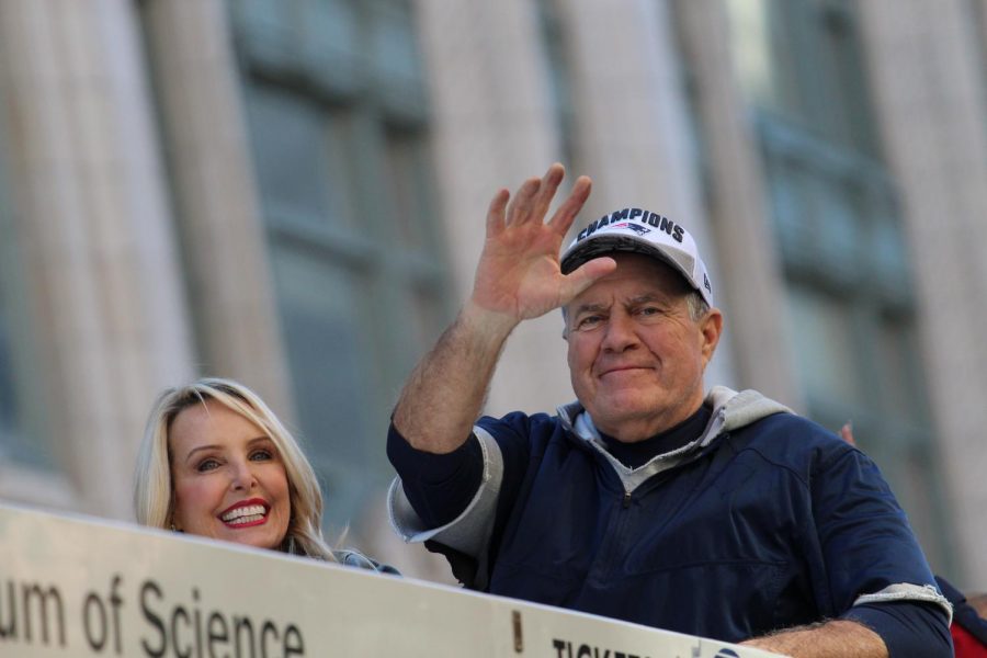 Coach Bill Belichick flashed a rare smile for the cheering fans. 