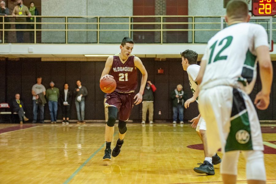 Freshman Alex Karaban had a standout performance during the district semi-finals where he scored 20 points at  Worcester Polytechnic Institute on March 3.   