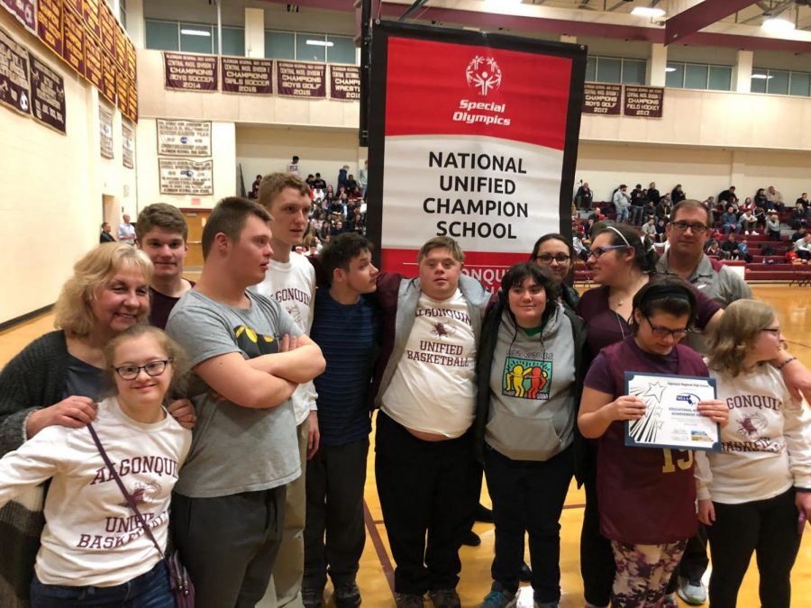 Members of the unified basketball and unified track teams celebrate awards recognizing inclusivity.