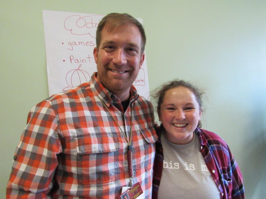Science teacher and Best Buddies adviser Kevin Hausmann and senior and Best Buddies president Hailey Lowe posed for this picture in October. By March, Best Buddies has hosted events ranging from pumpkin-carving parties, to friendship dances, to assemblies. They are currently planning the inclusion coffeehouse, a free event where students of all abilities can showcase their talents.