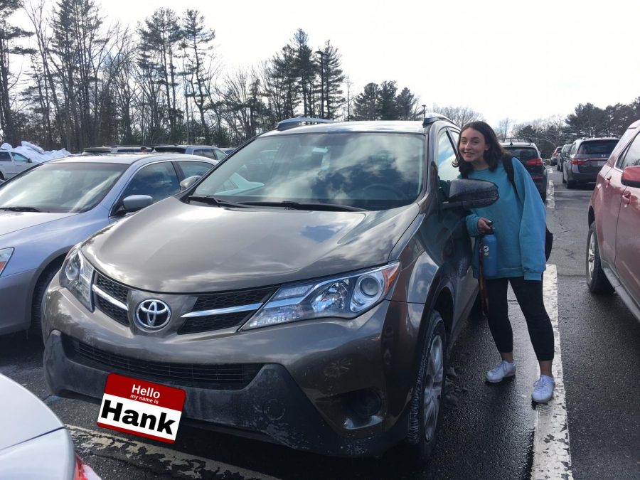 Senior Olivia Reilly poses with her 2014 Toyota Rav Four, Hank. 