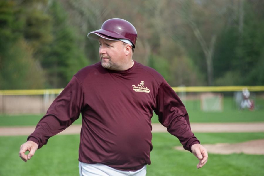 As+the+inning+closes+in+the+game+against+Marlborough+on+April+29%2C+new+baseball+varsity+coach+Brian+Doherty+looks+back+to+praise+one+of+his+players.